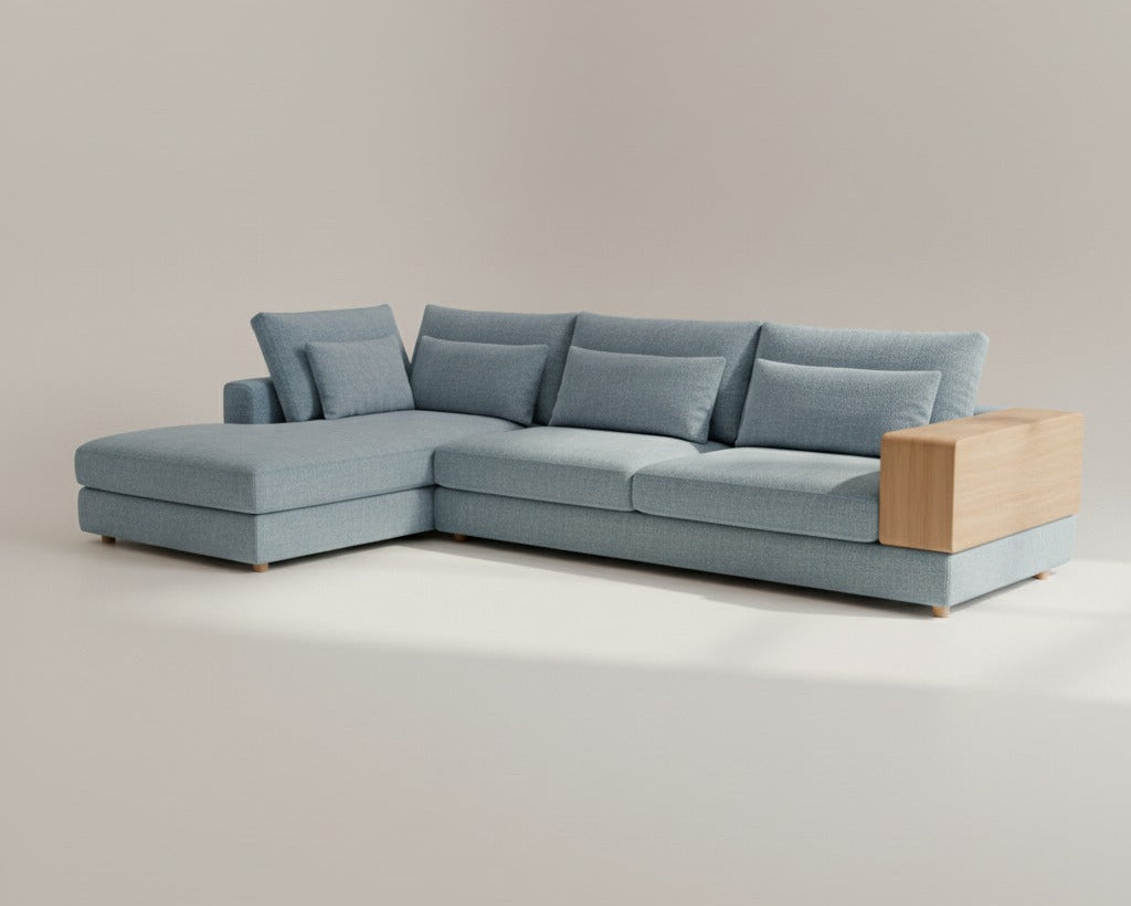 Blue sectional sofa with wooden armrests on a beige background