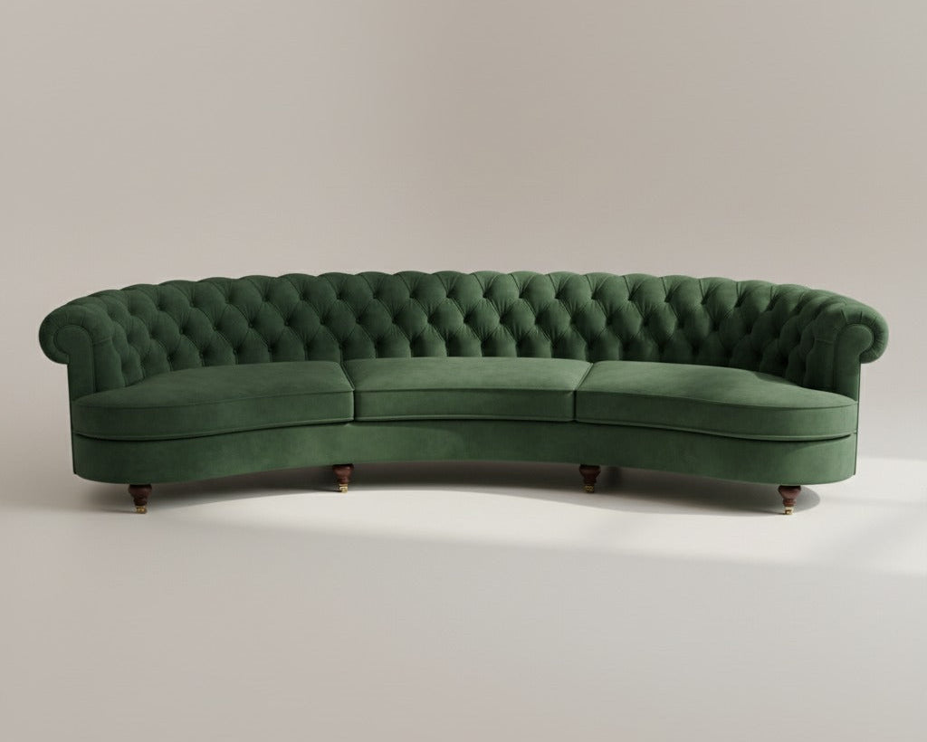 Green curved sofa on a plain background